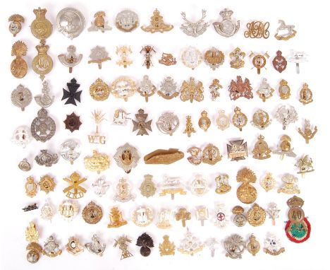 A good collection of approx x100 assorted British Army military uniform cap badges - various eras and conflicts represented, 