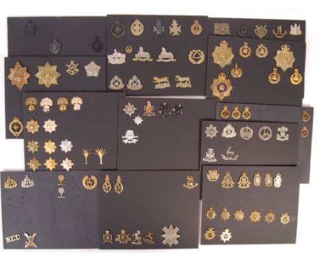 A good large collection of approx x95 assorted vintage and antique British Army military uniform cap badges. Various eras, re