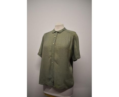 A 1940s sage green blouse, having scalloped collar, drawn thread work detailing to bodice and buttons to front, medium to lar