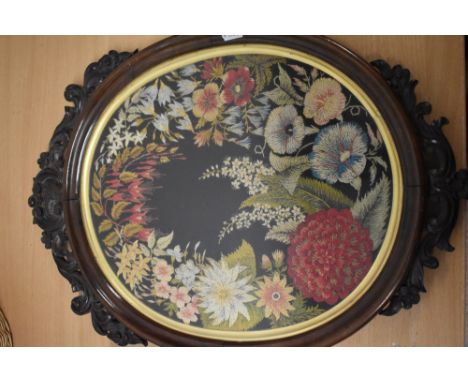 A framed and glazed Victorian panel, depicting finely detailed sprays of flowers.