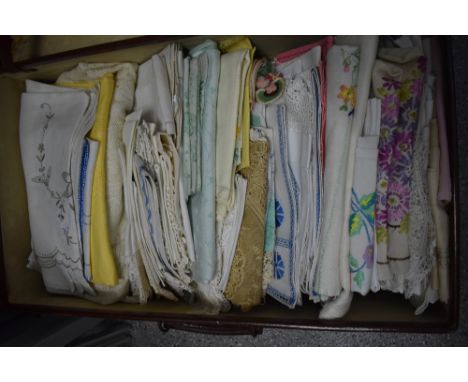 A suitcase of mixed vintage and antique table linen, including embroidered items, lace and crotchet edged etc.