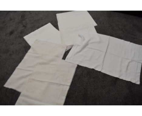 A selection of Victorian bed linen, including two matching pillow cases, a single pillow case and two sheets, each around a d