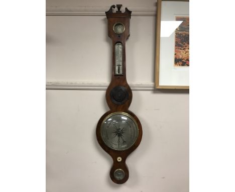 An early Victorian inlaid mahogany barometer