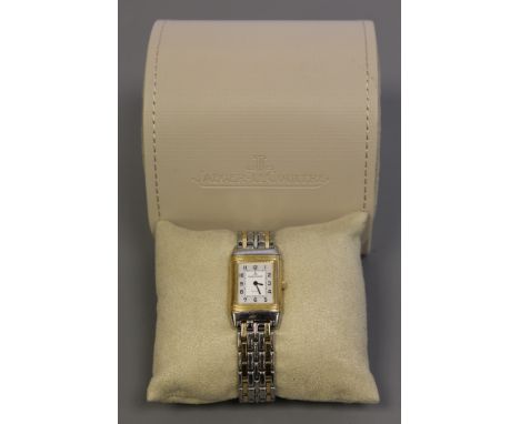 A lady's steel and gold Jaeger LeCoultre wristwatch, model: Reverso, Ref: 260.5.08, quartz movement, silvered dial with Arabi