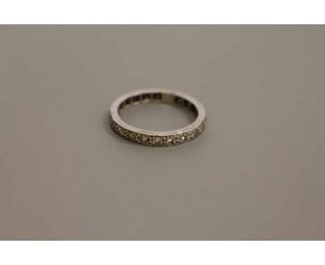 A white gold diamond set eternity ring, size N