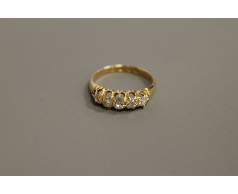 An antique 18ct gold five-stone diamond ring, approximately 0.8 carat