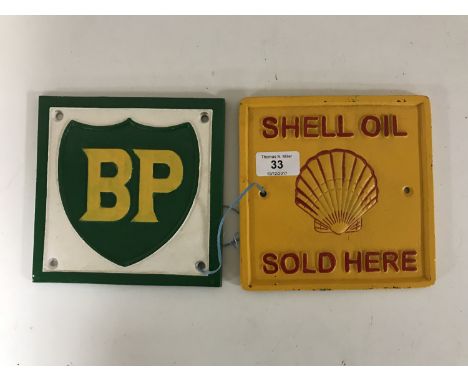 Two square cast iron signs - BP and Shell 