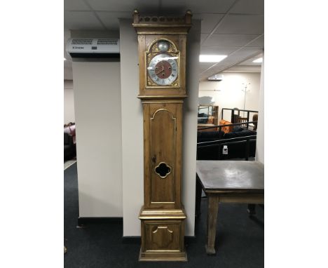 An early 20th century pine longcase clock by Markus Larsen of Ronne dated 1925 