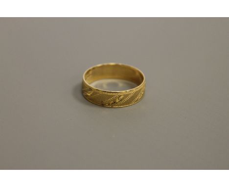 An 18ct gold band ring, 3.8g