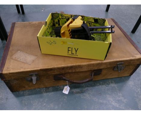 Vintage leather suitcase and Record vice