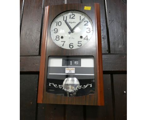 Mid 20th century Rhythm 30 day wall clock with calendar  