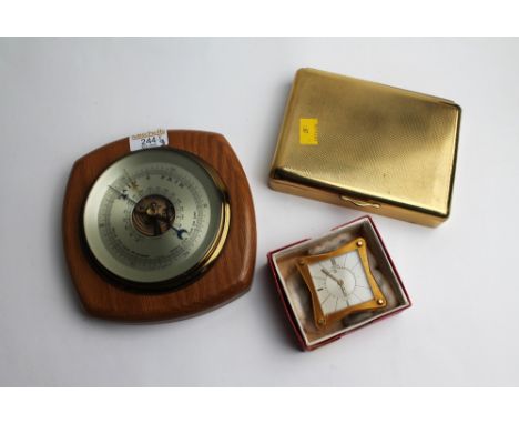 Barometer, cigarette box and Jaeger clock with 8 day movement inscribed to the back Mary Starkey Ladies Alpine club 1945-1959