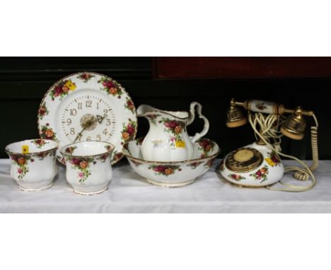 Royal Albert Old Country Rose clock, telephone, jug and bowl and two planters 