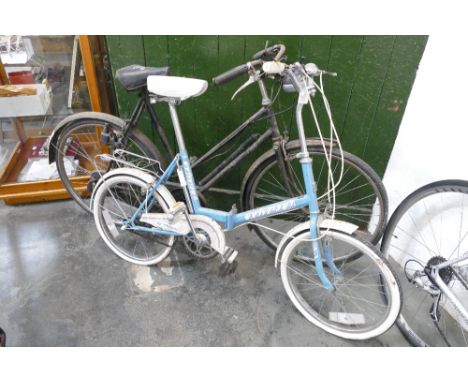 Two vintage bicycles, one Universal folding bike 