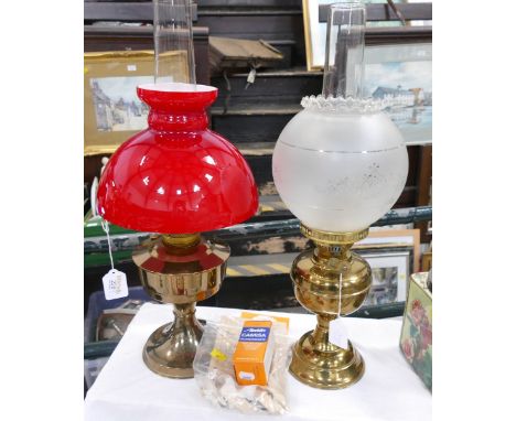 Two vintage oil lamps with shades and chimneys 