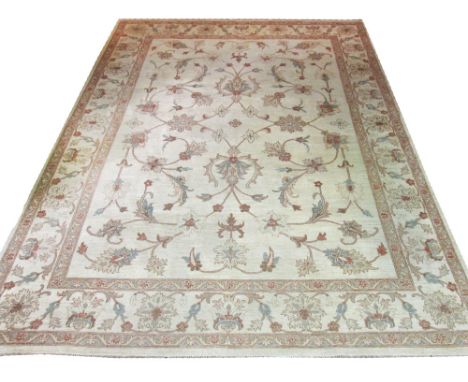 FINE ZIEGLER CARPET, 356cm x 269cm, all over palmette and scrolling vine design on an ivory field inside corresponding border