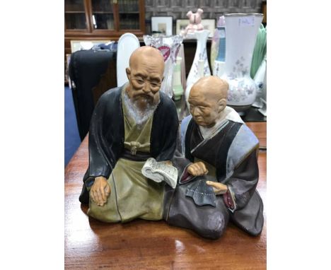 JAPANESE CERAMIC FIGURE GROUP OF TWO MONKS