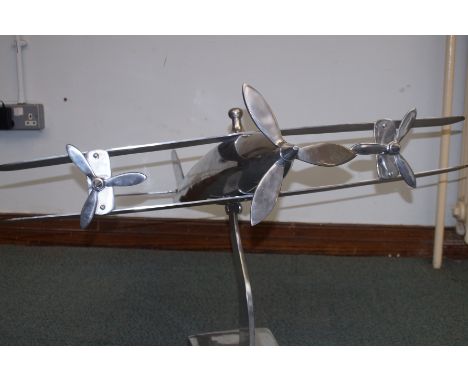Very large chrome model of a Bi-plane. Total weight 8kgs 60x98x98cm