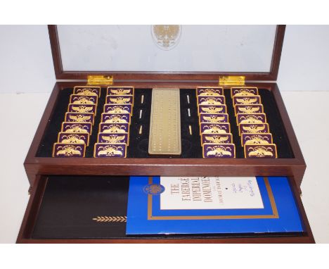 The Fabergé Imperial Dominoes by the house of Fabergé. Two compartment display box complete with board and manual 