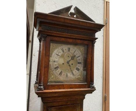 C19th walnut veneer Longcase clock, with square hood, below a broken arch pediment, to a silvered and ormolu decorated dial, 