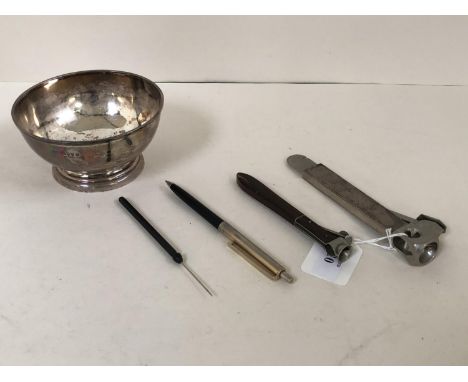 A Sterling silver cigar cuter by Mappin &amp; Webb (import marks) together with a fruitwood handled example, and a dish PURCH