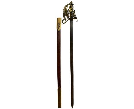 73cm blade with rounded tip, characteristic brass hilt composed of flattened rounded bars united by heart-pierced junction pl