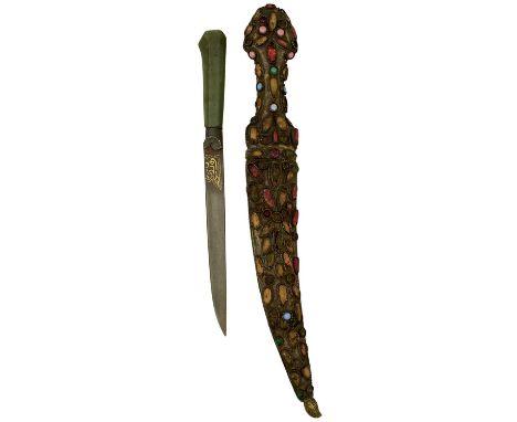 12cm watered steel blade decorated with calligraphy at the forte in gold, faceted green jade hilt, together with a worn Turki