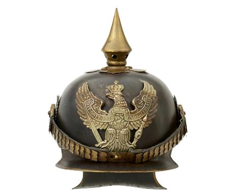 the refinished steel skull brass and white metal mounts, white metal Prussian helmet plate, brass spike finial on quatrefoil 