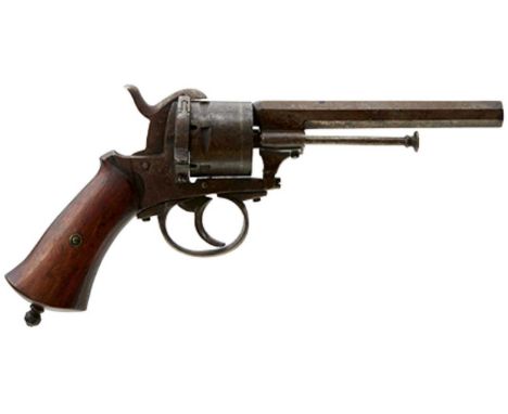5inch sighted octagonal barrel, plain cylinder and frame, loading gate on right side, wooden grips, lanyard ring lacking. L&a