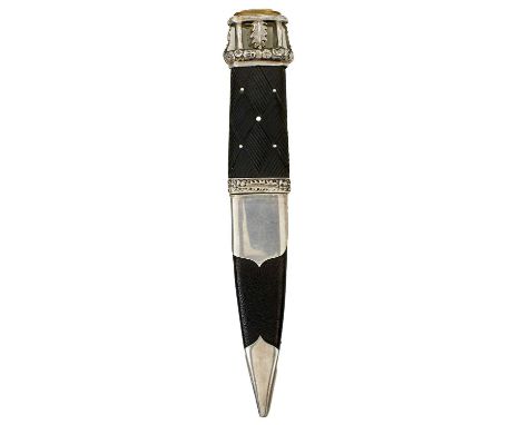 9.5cm fullered blade with faceted back edge, grey staining, characteristic carved basket weave wooden hilt set with white met
