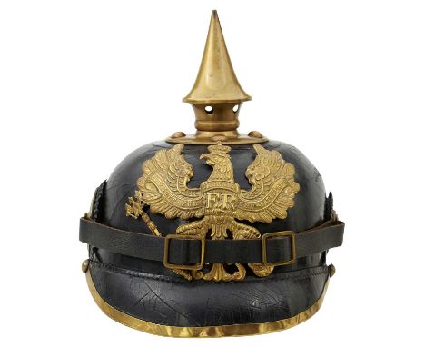 the black leather skull with brass mounts, Prussian helmet plate, one two-piece cockade and one stamped and painted Imperial 