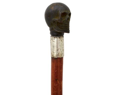 66cm rectangular section tapering blade stamped BRIGG, malacca haft and handle with skull pommel and white metal collar, 92cm