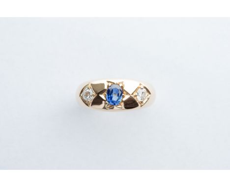 with two diamonds, approx .15ct each, with sapphire to the middle, ring size M 1/2, total weight 6 grams