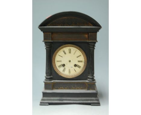 A circa 1900 ebonised mantel clock, having a continental brass eight day striking movement  
