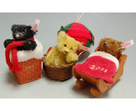 Three miniature Steiff collectable bears to include; Christmas 2010, Christmas 2011 and Christmas 2012, with supporting certi