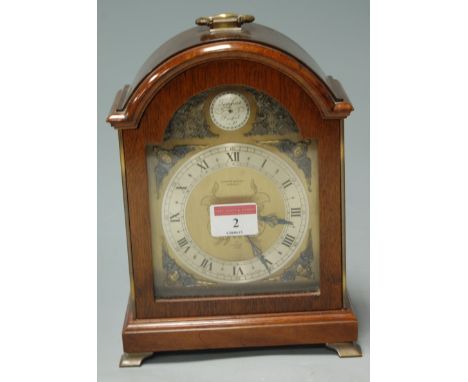 An Elliott walnut cased mantel clock, retailed by Windsor Bishop of Norwich 