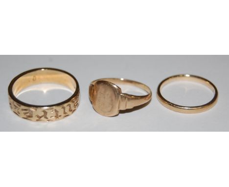 A 9ct gold band ring, yellow metal signet ring, and one other band ring indistinctly marked, gross weight 6.7g