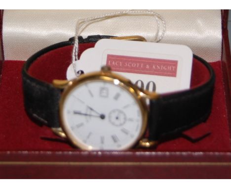 A Rotary gilt metal cased gents dress watch having quartz movement and date aperture with original box