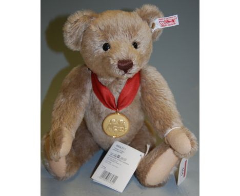 A modern Steiff collectors bear 'The bear of the year 2011', with supporting certificate of authenticity 