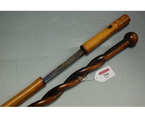 A late 19th century bamboo swordstick; together with a Victorian walking stick (2) 