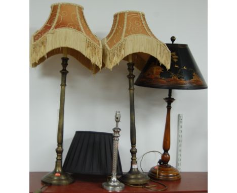 A pair of reproduction brass table lamps, a plated single lamp, and a turned hardwood lamp with shade (3) 