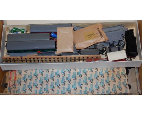 Two boxes of 00 gauge track, carriages etc; together with a Scalextric model motor racing set 