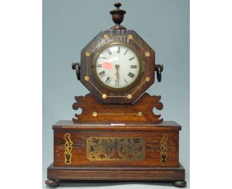 A 19th century rosewood and brass inlaid mantel clock, having convex white enamel dial, having a verge fusee watch movement, 