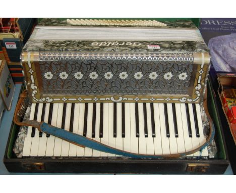 A cased Geraldo piano accordion 