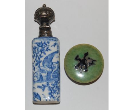 A Chinese porcelain scent bottle, underglaze blue printed with a figure landscape scene, having white metal hinged cap; and a