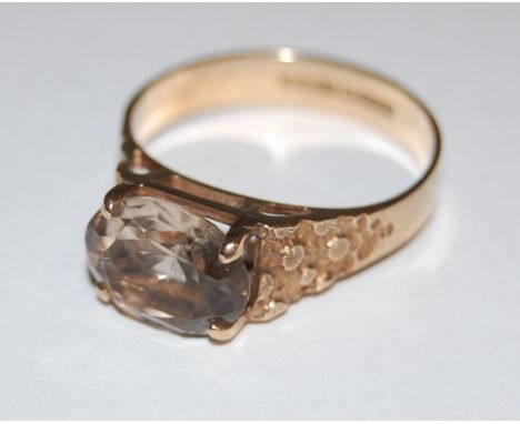 A 9ct gold Modernist citrine set dress ring, hallmarked for Asprey & Co, Birmingham 1976