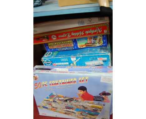 A quantity of boxed games to include; Tin Can Alley target game, Gama battery operated crane, The Funny Train etc 