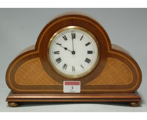 An Edwardian mahogany and inlaid mantel clock, having French brass eight day cylinder movement 