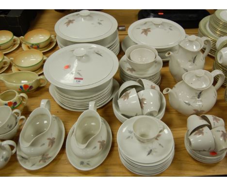 A Royal Doulton extensive part dinner and tea service in the Tumbling Leaves pattern 
