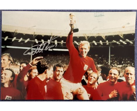 Geoff Hurst signed 16x12 inch 1966 World cup final colour print pictured celebrating with his England teammates. Good conditi